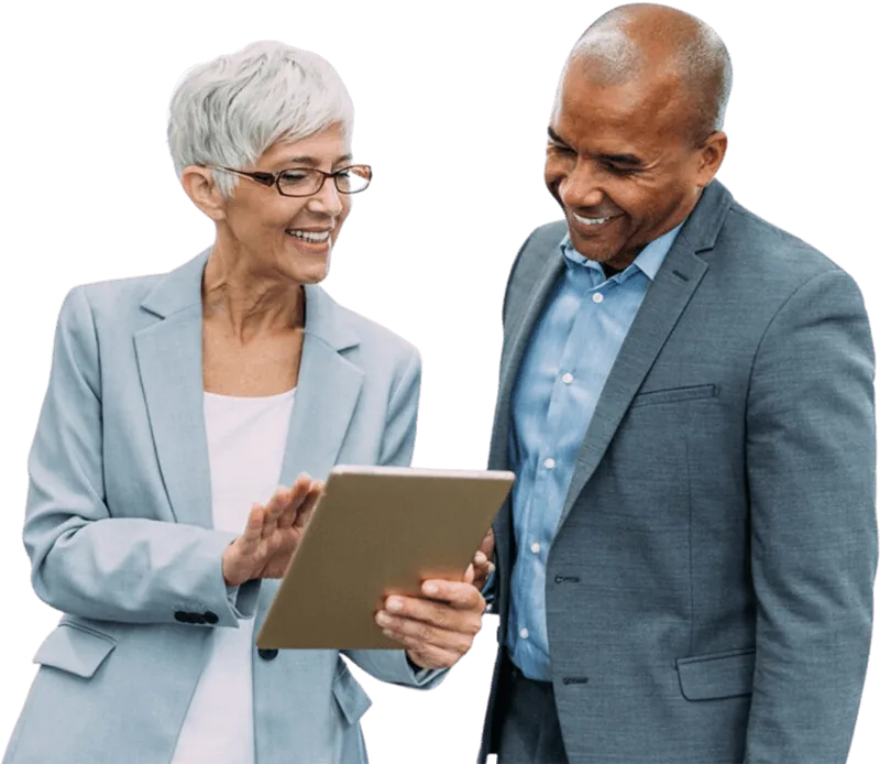 Two business leaders reviewing results on a tablet